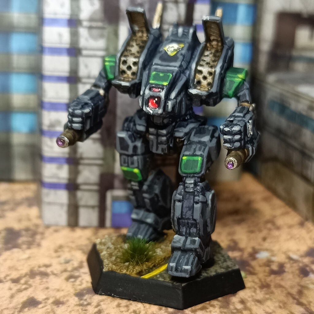 an Archer miniature painted in black with green accents