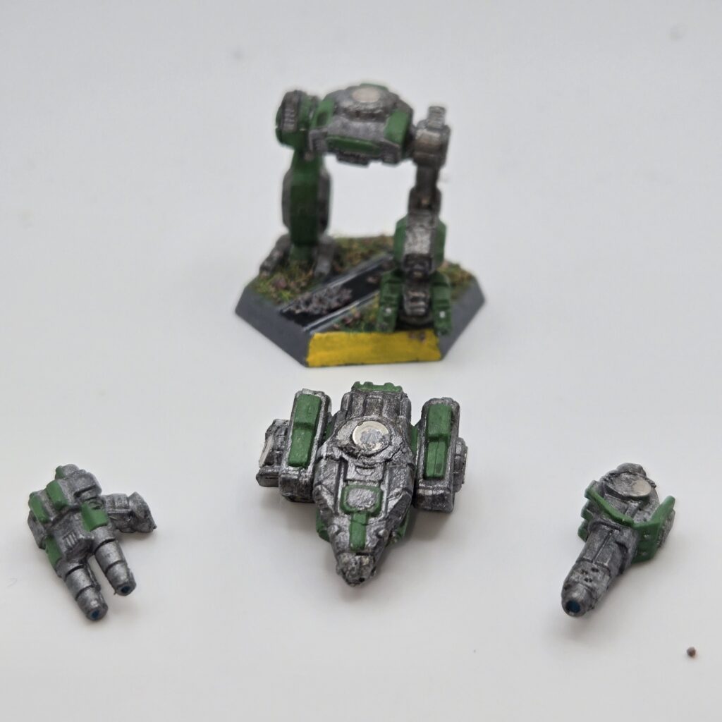 Black Lanner miniature painted metallic grey with green accents. The torso and arms have been magnetized and disassembled
