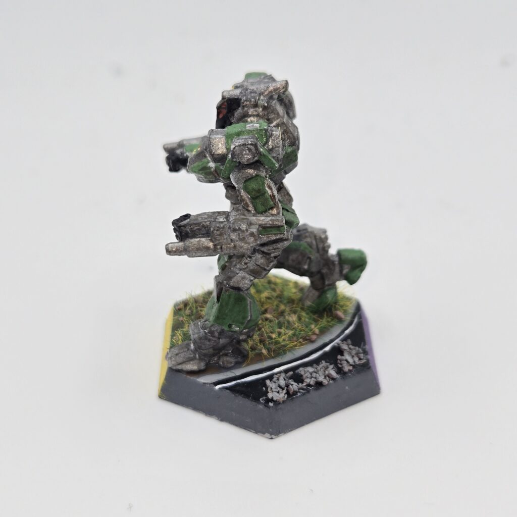 Hellion miniature painted metallic grey with green accents