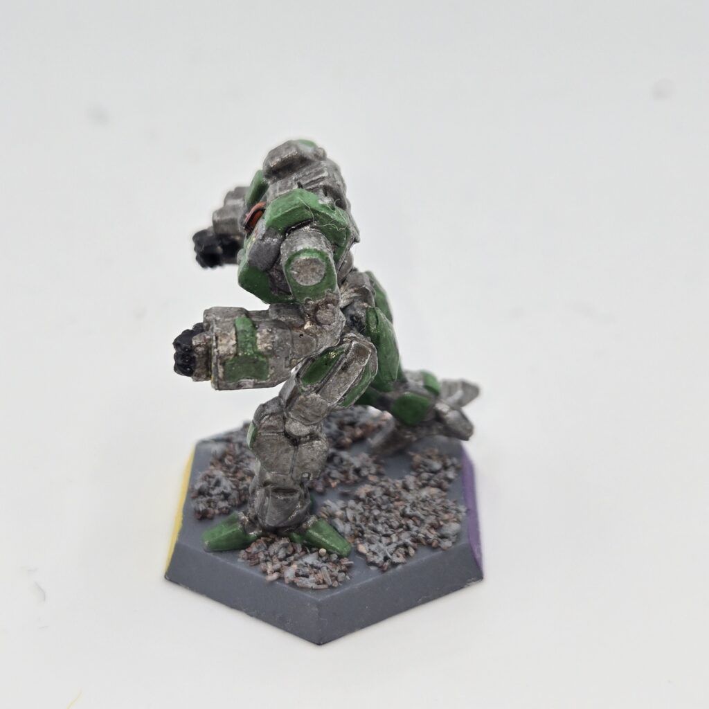 Mist Lynx miniature painted metallic grey with green accents