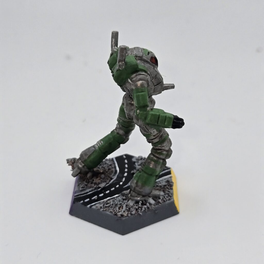 Ostscout miniature painted metallic grey with green accents
