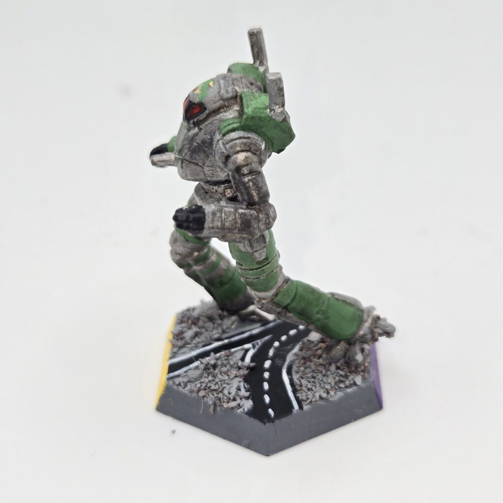 Ostscout miniature painted metallic grey with green accents