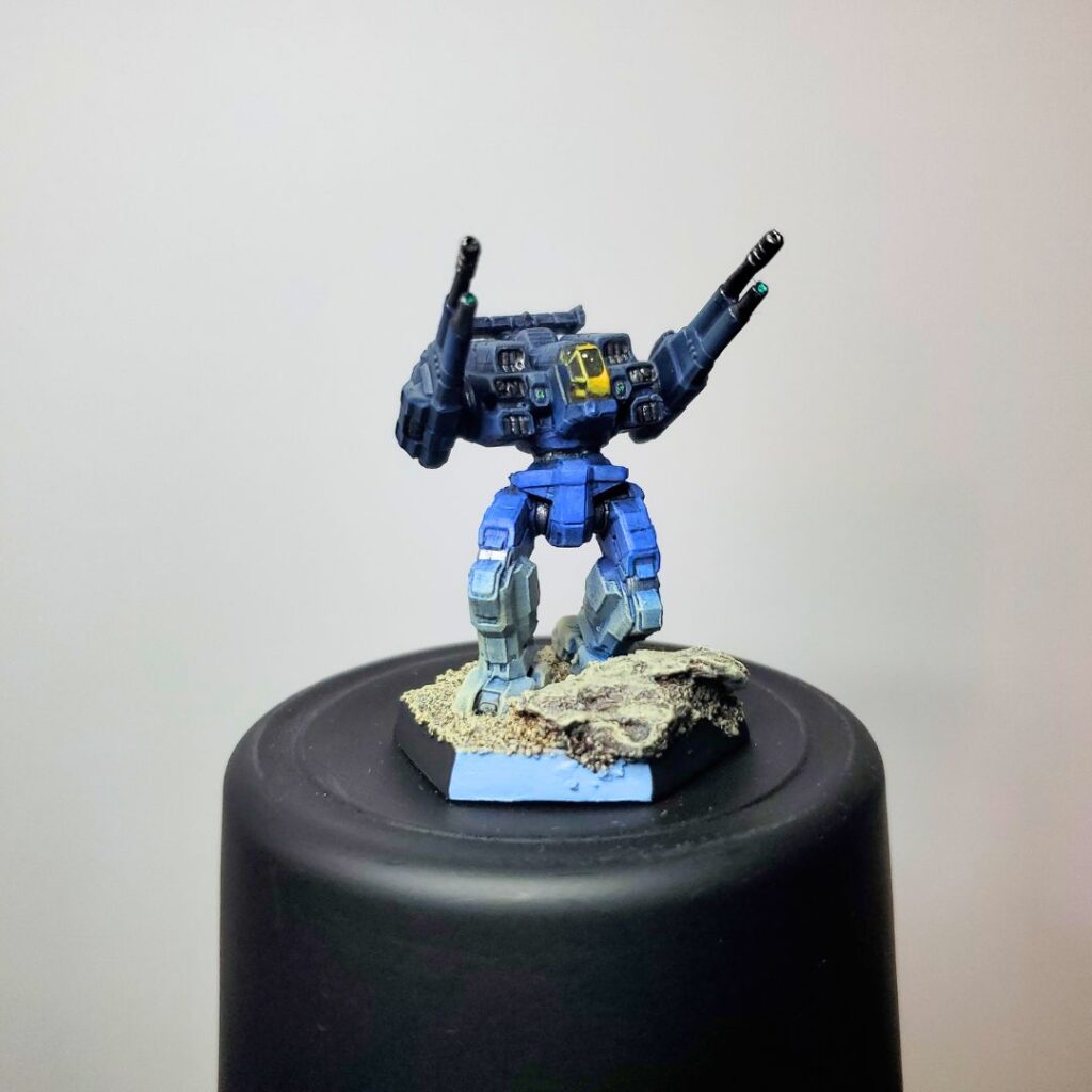 a Rifleman miniature painted in a grey-to-blue gradient