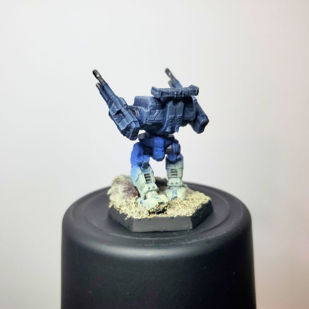 a Rifleman miniature painted in a grey-to-blue gradient
