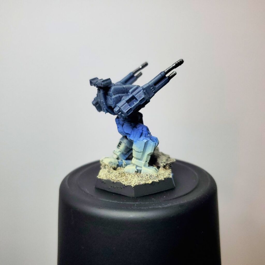 a Rifleman miniature painted in a grey-to-blue gradient
