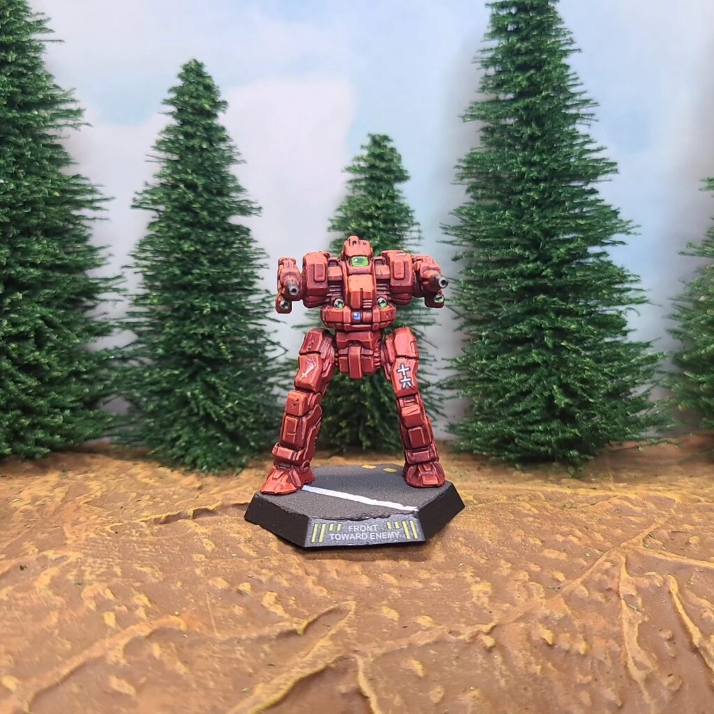 a Blackjack miniature painted red with green cockpit accents