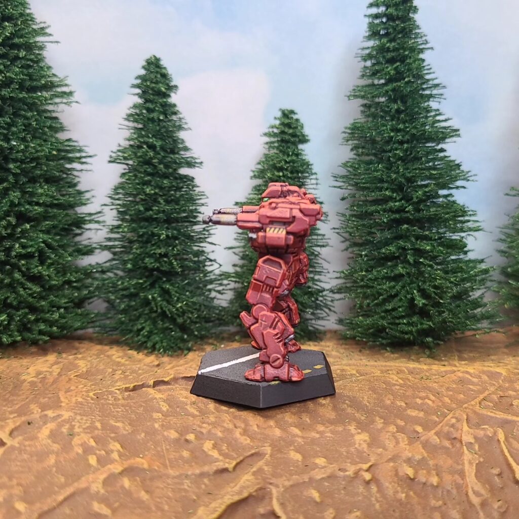 a Blackjack miniature painted red with green cockpit accents