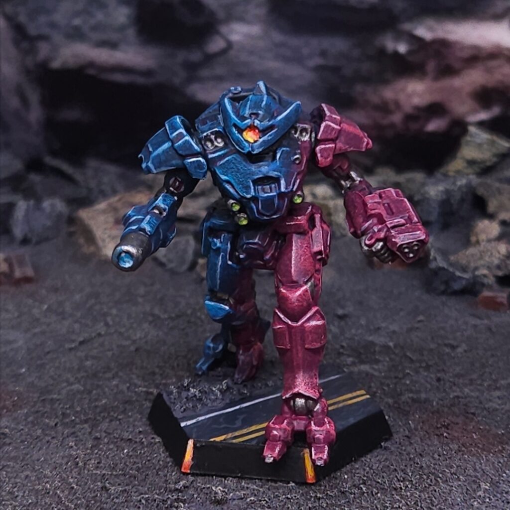 Vapor Eagle miniature painted blue, purple, and pink