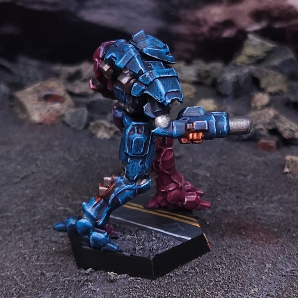 Vapor Eagle miniature painted blue, purple, and pink