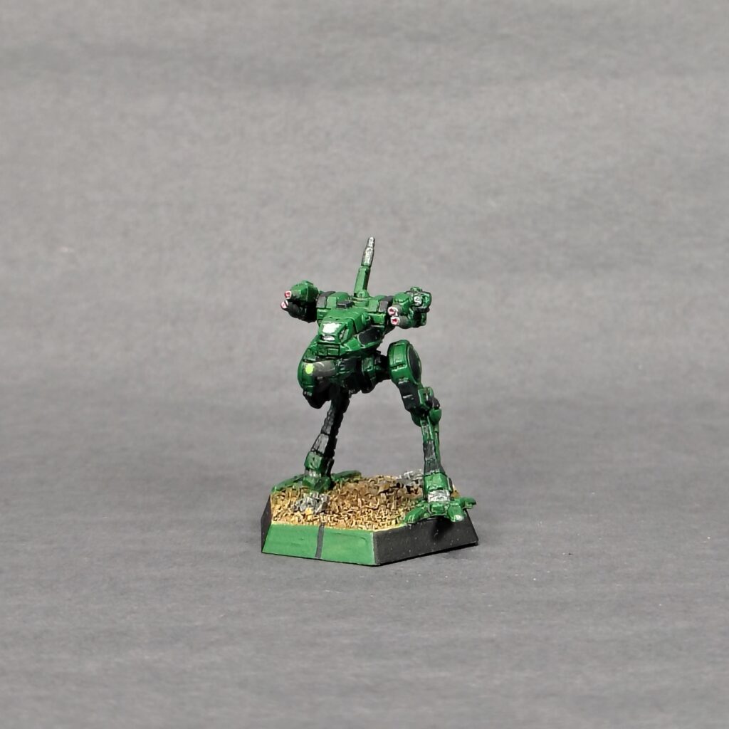 a Locust miniature painted green with black accents