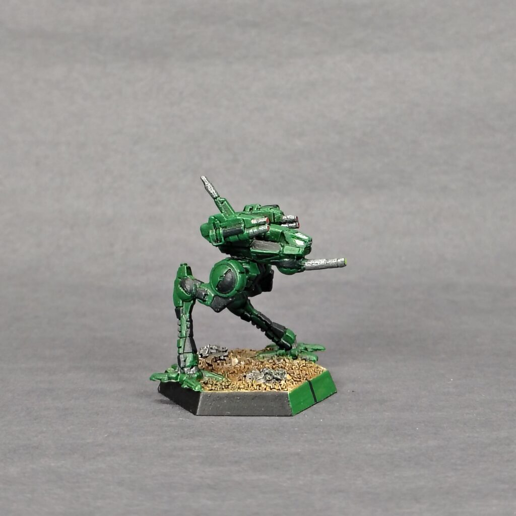a Locust miniature painted green with black accents