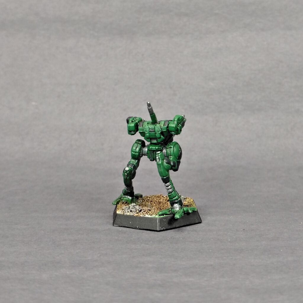 a Locust miniature painted green with black accents