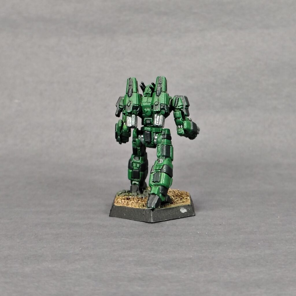 a Phoenix Hawk miniature painted green with black accents