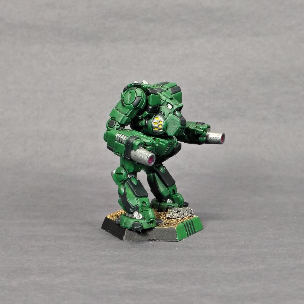 a Thug miniature painted green with black accents