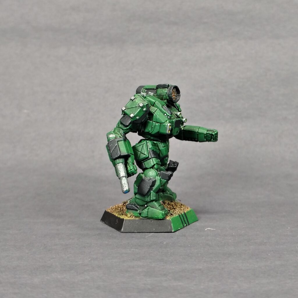a Thunderbolt miniature painted green with black accents