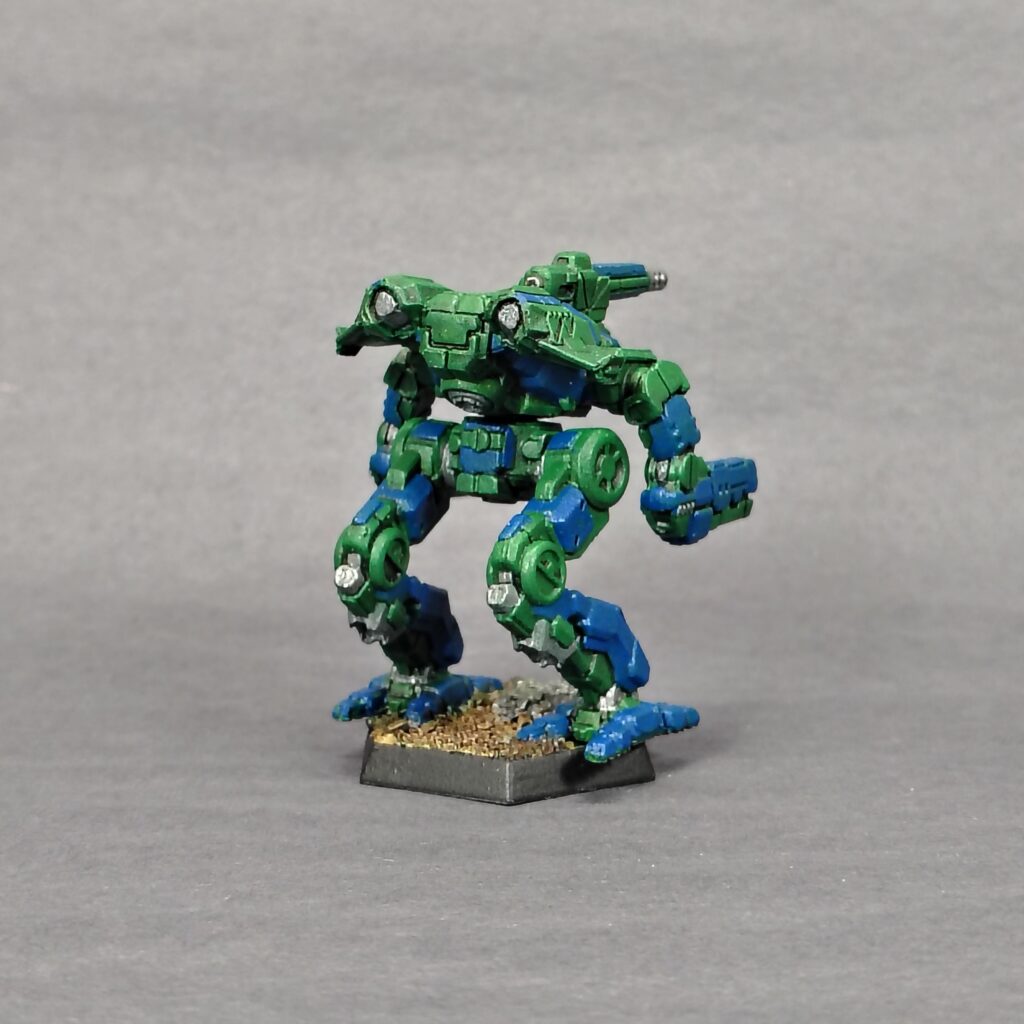 a Marauder II miniature painted green with blue accents